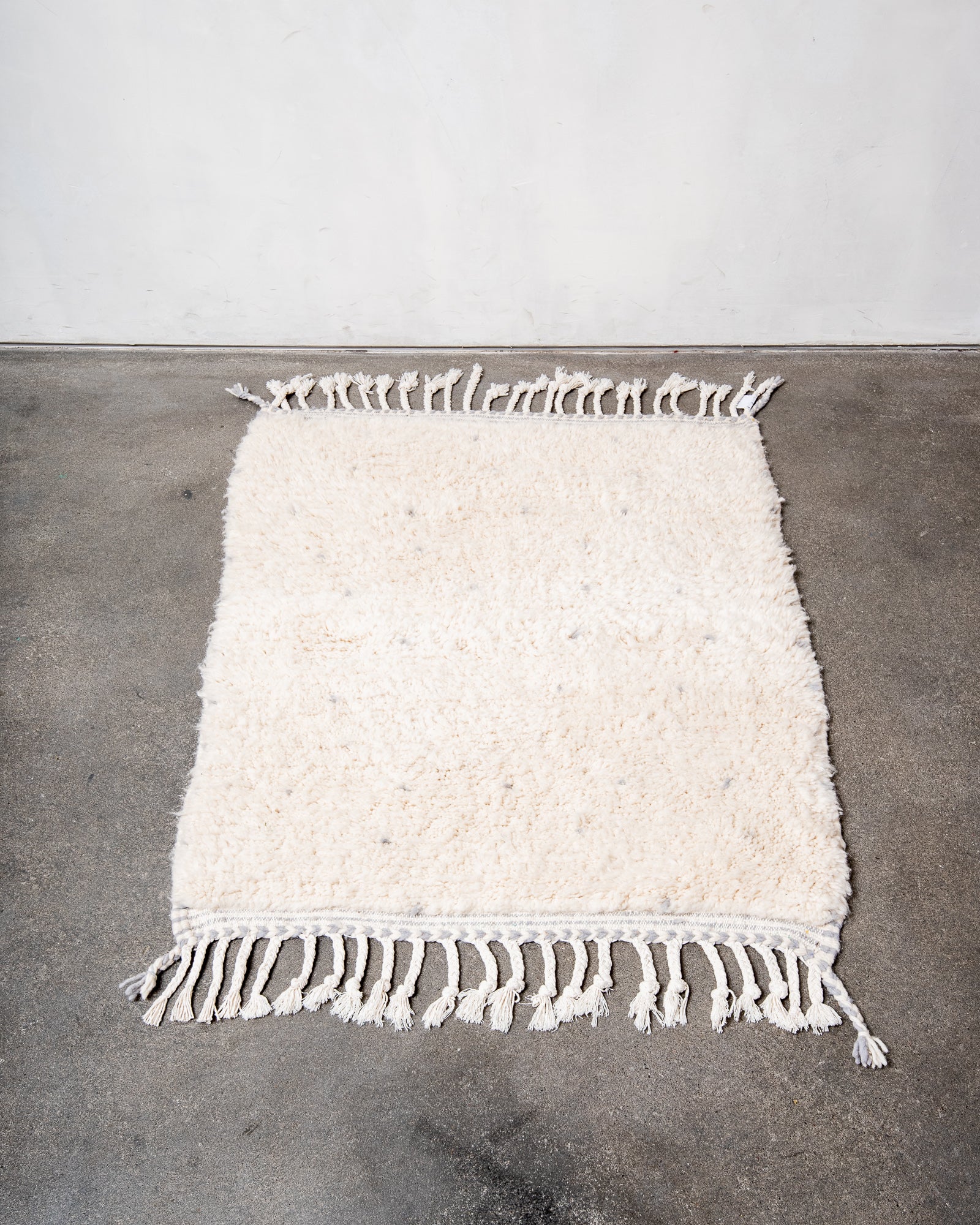Modern, designer, handcrafted Berber rug from Morocco. Beniourain carpet with beautiful colours and patterns and fluffy wool texture.